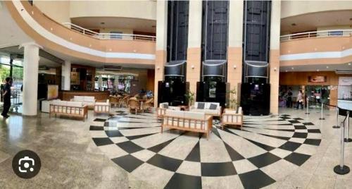Tropical Executive Hotel APT 606 in 河濱