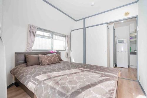 A boutique one-bedroom apartment in Takadanobaba, Shinjuku Ward, Tokyo. A 6-minute walk to the Yamanote Line