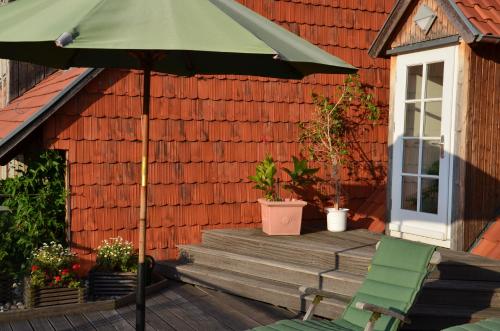 ระเบียง/ชานเรือน, Quartier am Brunnen in เควดลินบวร์ก