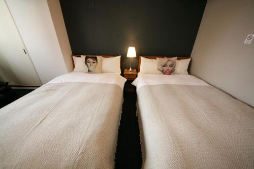 Standard Room (Two Small Double Beds) with Kitchen - Non-Smoking - No Cleaning for Consecutive Night Stays image 7