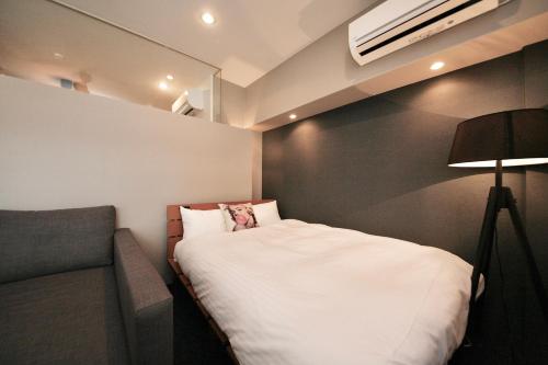 Deluxe Room (Three Double Beds) with Kitchen - Non-Smoking - No Cleaning for Consecutive Night Stays image 6