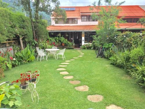 Dārzs, Hostal Santa Clara B&B in Apaneca