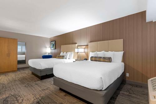 Queen Room with Two Queen Beds room in Best Western Red Coach Inn