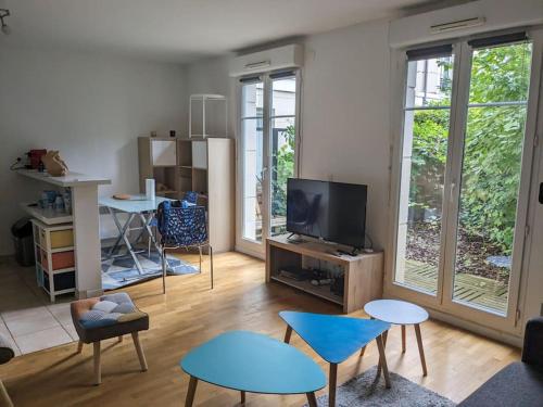 Studio au calme avec jardin proche Paris - Location saisonnière - La Garenne-Colombes