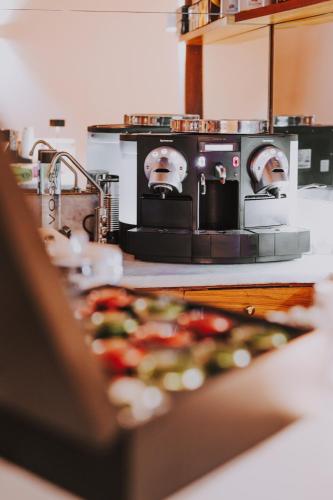 บริการและสิ่งอำนวยความสะดวก, อัลแบร์โก เดลเล เรจอนี (Albergo delle Regioni) near เปียซซา ดิ สปัญญา