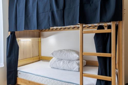 Bed in 6-Bed Female Dormitory Room