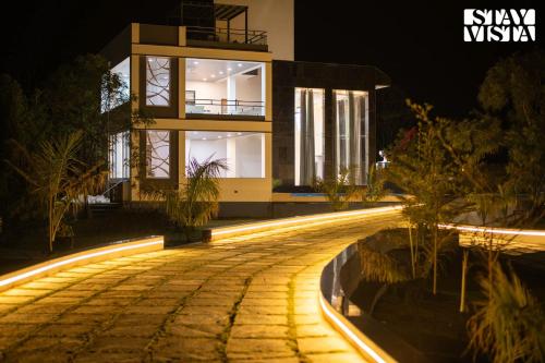 StayVista's Avadh Vatika - Mountain-View Villa with Outdoor Pool, Lawn featuring a Gazebo & Bar