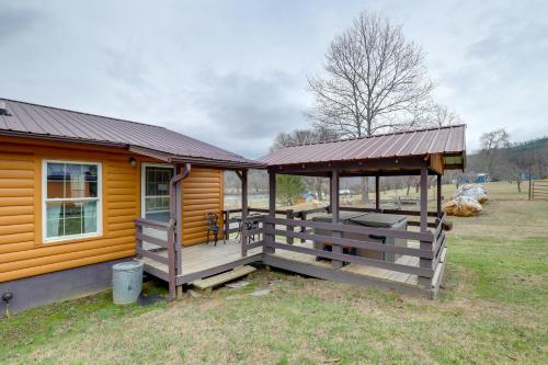 Riverfront Hot Springs Cabin with Private Hot Tub!