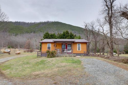 Riverfront Hot Springs Cabin with Private Hot Tub!