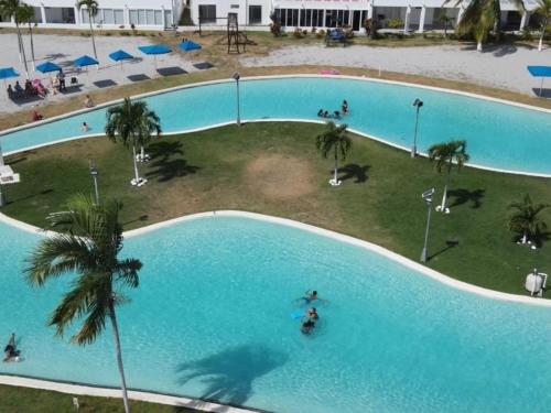 . Beach-Style Pool Villa Paradise