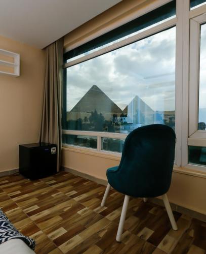 Turquoise Pyramids & Grand Egyptian museum view Hotel