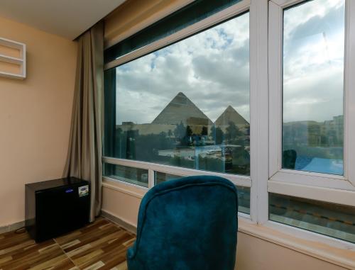 Turquoise Pyramids & Grand Egyptian museum view Hotel