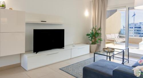 sala de TV, Apartamento Premium con Jacuzzi y vistas al mar en Punta Prima, Torrevieja by Rentalole in Punta Prima