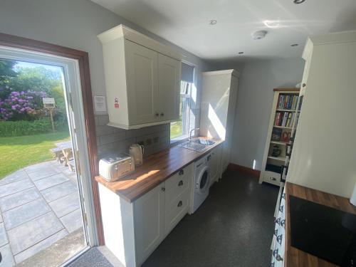 Houghton Park Holiday Cottage in Ньюкаслтон
