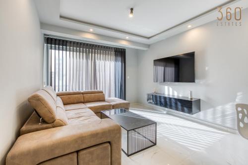 Modern home with Private Balcony with side Seaview by 360 Estates