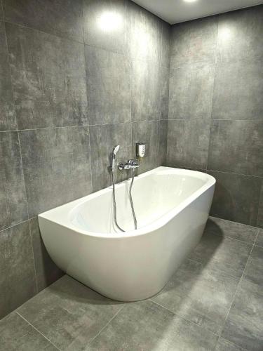 Fürdőszoba, Hotel Quellenhof in Grainau