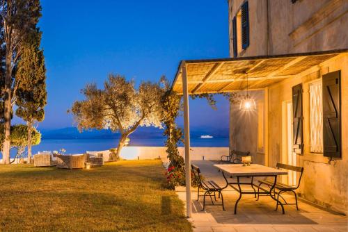 Magnificent Seafront Corfu Villa - 5 En-Suite Bedrooms -The Durrells House | Historic Elegance & Modern Luxuries - Direct Beach Access & Private Heated Pool