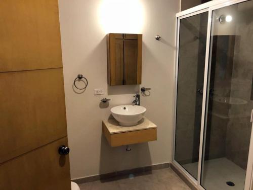 Bahia del Tezal 103b, 1BR Modern condo big rooftop pool walk to beach through Riu hotel in Cabo San Lucas, Mexico
