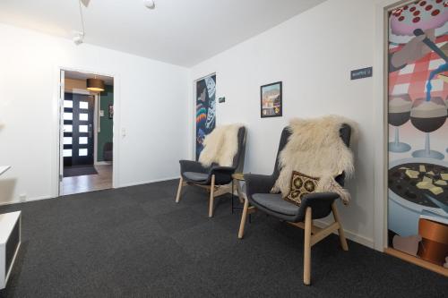 kawasan lounge/TV kongsi, Kulukis Downtown Hostel in Nuuk