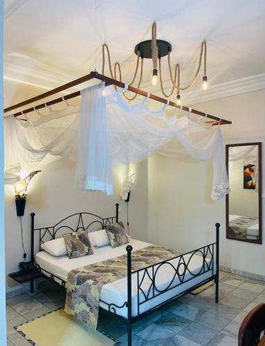 Bed, Le Lodge des Almadies in Dakar