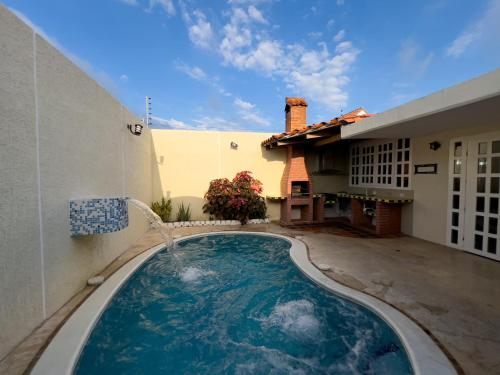 Swimming pool, Casa Vacacional Premiun 09 in Tucacas