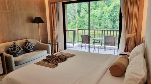 Tinidee Golf Resort Phuket - SHA Extra Plus