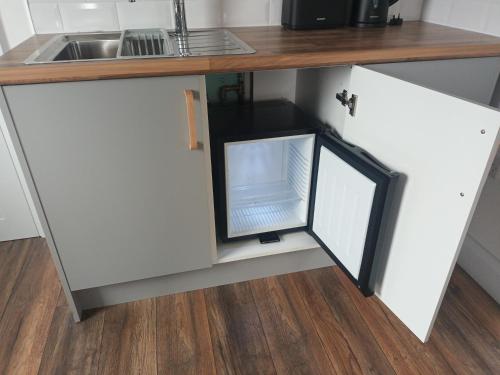 virtuve, Connemara Lake View Apartment in Camus