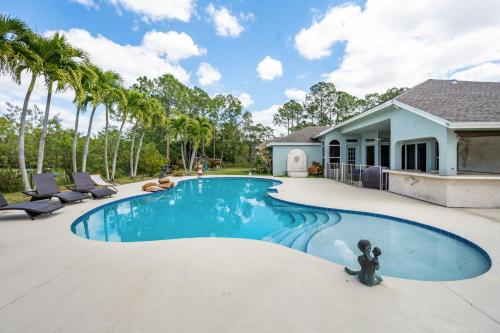 Luxury Pool Home, Serene & Spacious - Loxahatchee, Florida in Loxahatchee, Vereinigte Staaten von Amerika