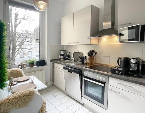 設施, Magic Forest Design Apartment, 65 Zoll TV, Waschtrockner, beste Lage, am Markt in 格拉