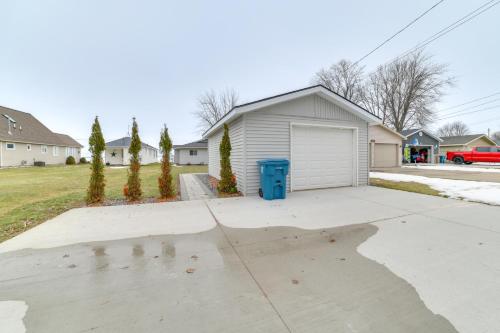 Bright Houghton Lake Home with Boat Dock and Fire Pit