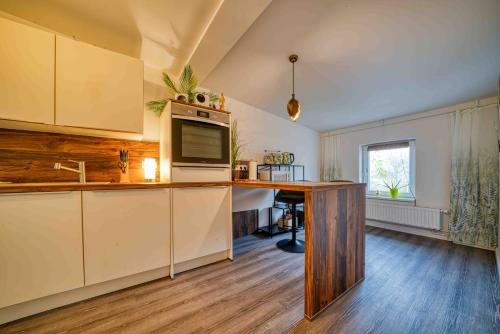 廚房, Zuarin Schlossblick - Ganzes Apartment direkt am Schlossgarten von Schwerin mit Dschungel-Feeling -  in 奧斯多夫