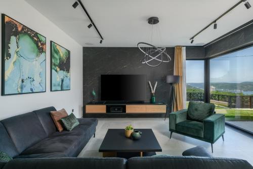 Koplietošanas atpūtas telpa ar TV, Villa Abba Rakalj - Meerblick, Luxus und Komfort an der Südostküste Istriens (Villa Abba Rakalj - Meerblick, Luxus und Komfort an der Sudostkuste Istriens) in Rakalj