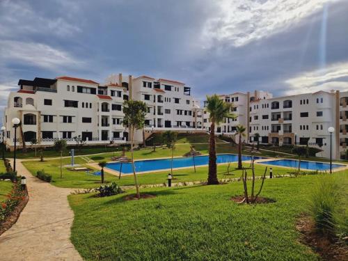 Сад, Superbe appartement neuf en résidence avec piscine (Superbe appartement neuf en residence avec piscine) in Cabo Negro