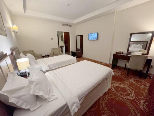 Standard Twin Room room in Al Rayyan Makiya Towers Hotel