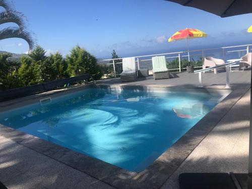 Entre ciel et mer piscine chauffée - Location saisonnière - Saint-Leu