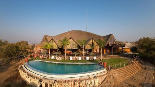 Басейн, Opuwo Country Lodge Campsite in Опуво