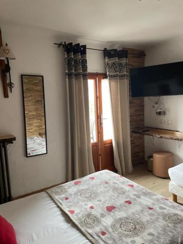 Triple Room with Balcony (2 Adults + 1 Child) and Slope View