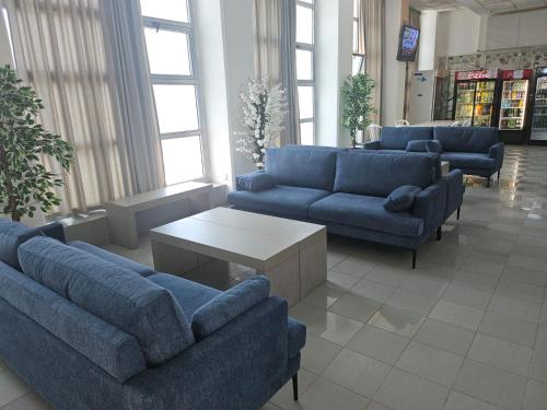 Eilat Octopus Apartment - אילת אוקטופוס -שני חדרים וסלון, בריכה בקיץ