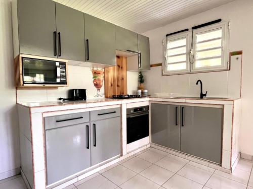Iekārtas, Appartement Le Colibri avec jacuzzi in Saint-Joseph