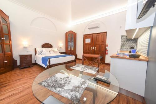 One bedroom house with shared pool terrace and wifi at Canico 1 km away from the beach