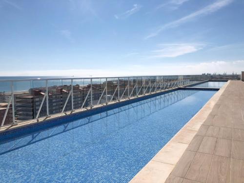 Úszómedence, Global Vacacional, Moderno apartamento con piscina y terraza en la playa de Canet in Canet d'En Berenguer