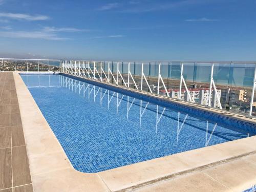 Úszómedence, Global Vacacional, Moderno apartamento con piscina y terraza en la playa de Canet in Canet d'En Berenguer