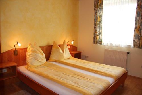Bio - Appartements Bischof, Familie Wind in Treffen Am Ossiacher See