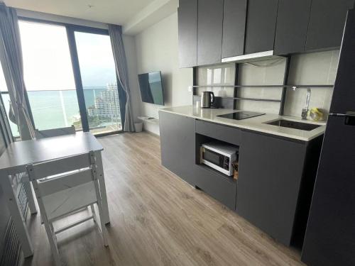 Andromeda Seaview Condo Near Beach