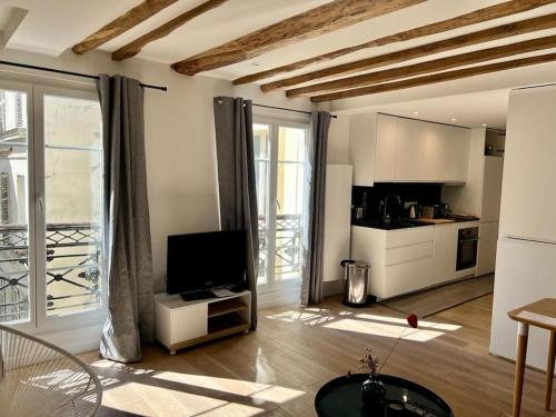 Appartement de charme en plein cœur de Paris, Paříž