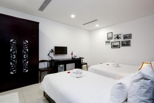 Dylan Hotel Danang - Tap to explore photos
