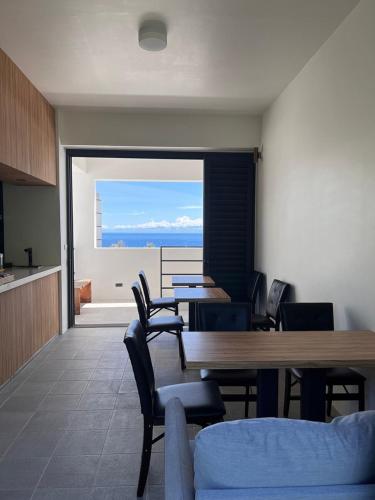 Shared lounge/TV area, Dawn Valley in Green Island