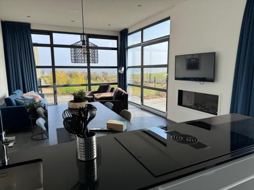 Enkhuizer Strand Chalet Strandpanorama Zweite Reihe mit Zaun Hausnr 203 in Boerenhoek Molenweg Burgwal