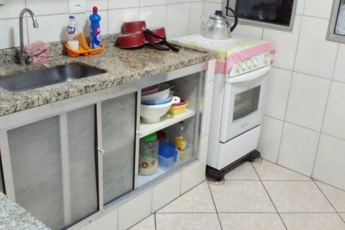 Kitchen, Apto familiar no Guaruja, proximo da Praia das Asturias near Churrascaria Yedo