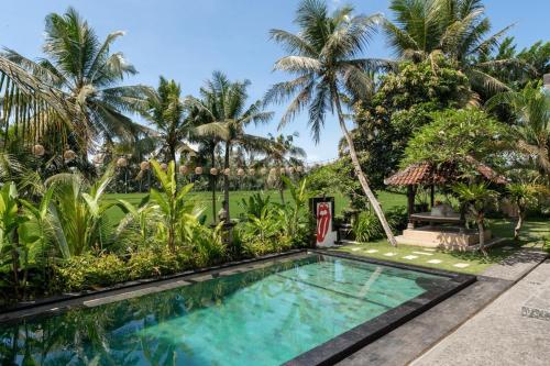 2BR Haven with Pool & Lush Garden - Embrace Bali's Soul Near Temples, Beaches & Rice Fields